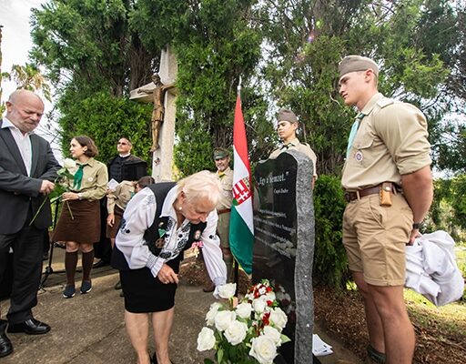 grief-care-laying-flowers-at-memorial-ceremony