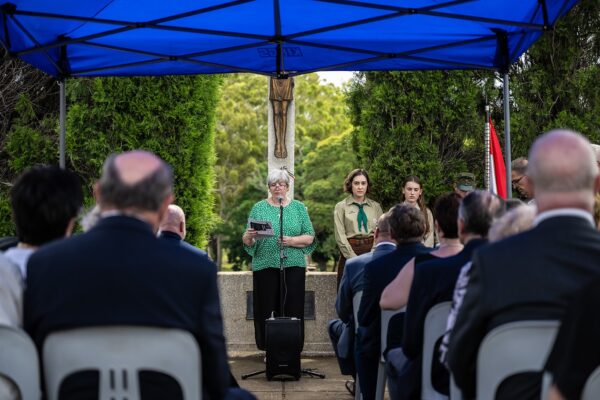 grief-care-remembrance-ceremony-speaker-scouts-cemetery-crucifix