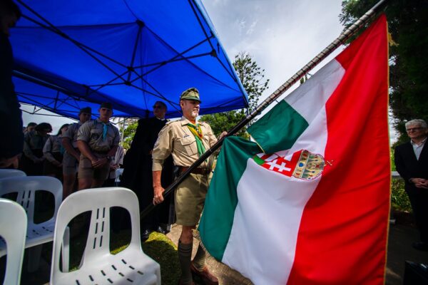 grief-care-scout-holding-ceremonial-flag-memorial-event